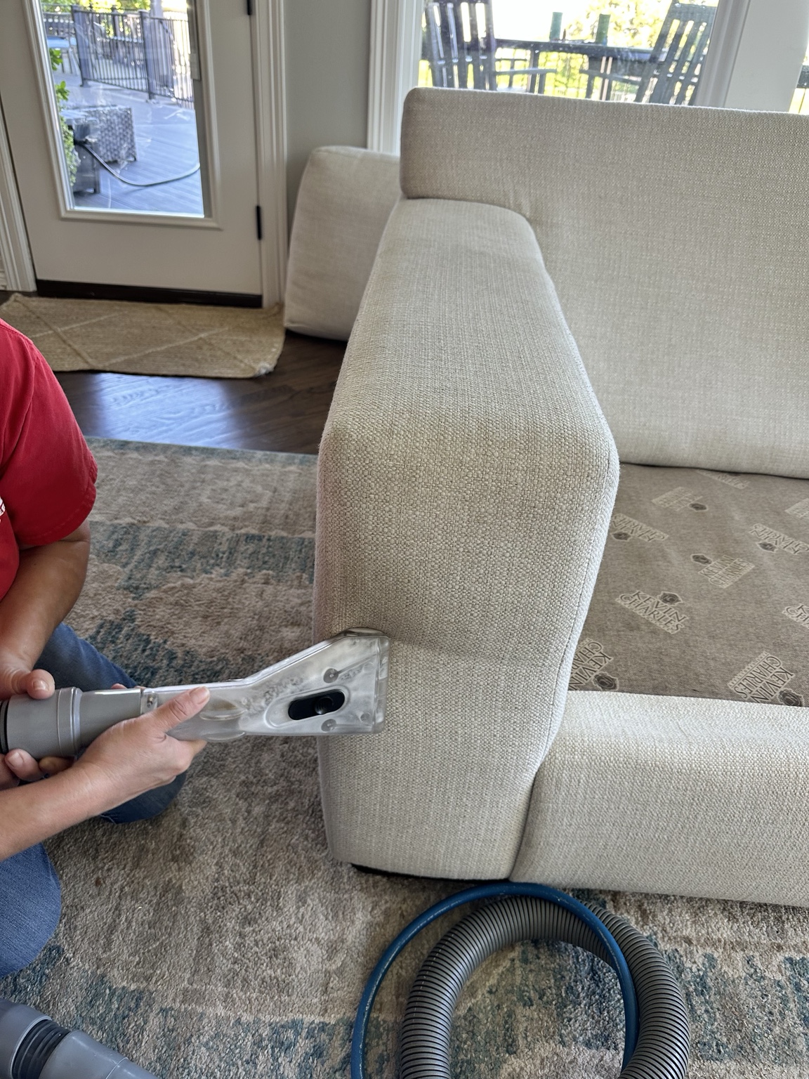 Sofa being professionally cleaned